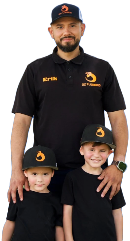 Erik, owner of OX Plumbing, with his two sons